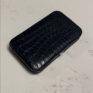 Makeover Essentials mini clutch. Black